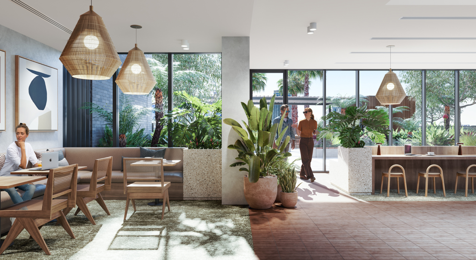 The Wentworth Quarter co-working space, with benches and seating areas to either side. The lush landscaped podium space is seen through the windows and glass door to outside.